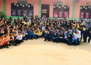 Bhabinkamtibmas Polsek Birem Bayeun Senam Pagi Bersama Siswa SD