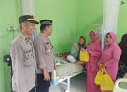 Polisi Berbagi, Kapolsek Manyak payed Sambangi warga Yang sedang sakit di Puskesmas 