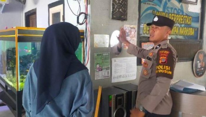 Polres Aceh Tamiang Pasang Stiker Larangan Bermain Judi Online di Warkop, Melanggar? Diproses Hukum