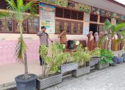 Saweu Sikula, Bhabinkamtibmas Polsek Langsa Jadi Pembina Upacara di SDN 10 Langsa