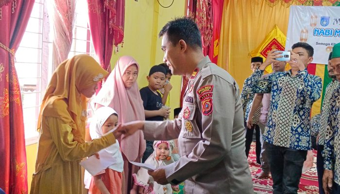 Kapolsek Langsa Hadiri Perayaan Maulid Nabi dan Santunan Anak Yatim di Gampong Peukan Langsa
