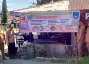 Polsek Langsa Pasang Spanduk Himbauan Larangan Judi Online di Gampong Daulat