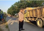 Bhabinkamtibmas Polsek Langsa Timur Beri Pelayanan Strong Point di Jalan Lintas Sumatera