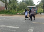 Personel Polsek Sungai Raya Gelar Strong Point Rutin untuk Kamseltibcar Lantas