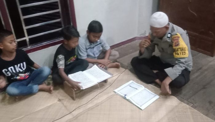 Bhabinkamtibmas Polsek Manyak Payed Gelar Tadarus Bersama Masyarakat di Bulan Suci Ramadhan